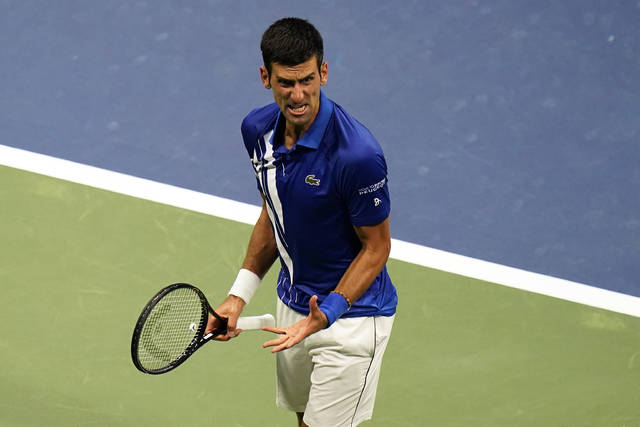 Djokovic bắt đầu hành trình chinh phục Grand Slam thứ 18:  Thắng dễ nhưng chưa hoàn hảo - Ảnh 5.