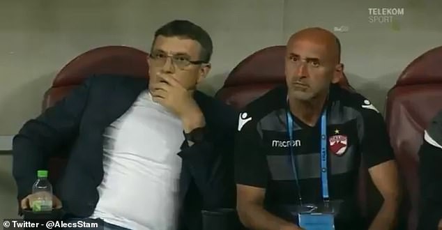 16320464-7270597-Dinamo_Bucharest_manager_Eugen_Neagoe_left_had_a_heart_attack_on-a-16_1563750790970