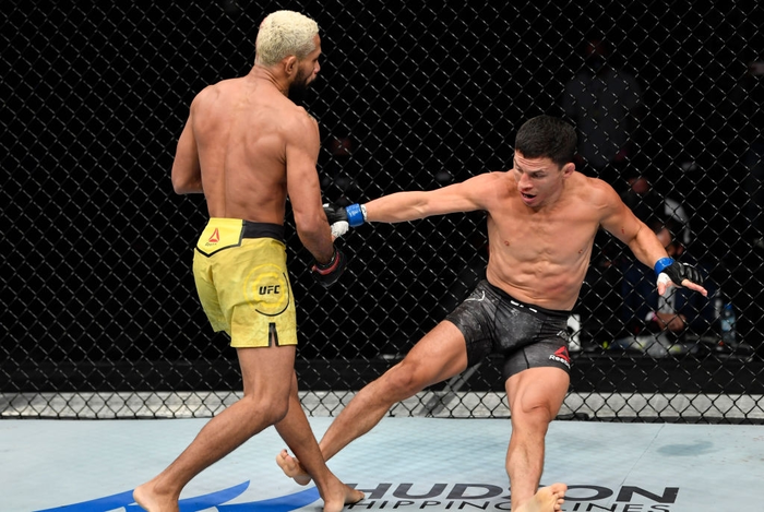 Figueiredo khóa gục Benavidez, giành về chiếc đai vô địch của UFC - Ảnh 3.