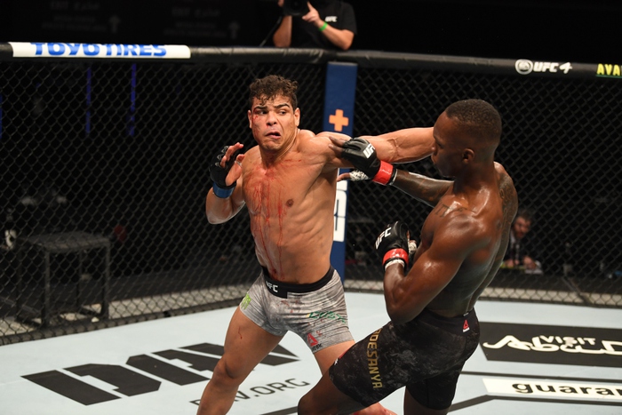 Israel Adesanya hạ đo ván đối thủ bất bại Paulo Costa, bảo vệ thành công chiếc đai vô địch UFC - Ảnh 2.