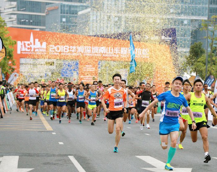 Bê bối chấn động tại giải marathon Trung Quốc: VĐV chạy đường tắt cho nhanh, mặc áo giả để tiếp sức lẫn nhau - Ảnh 2.