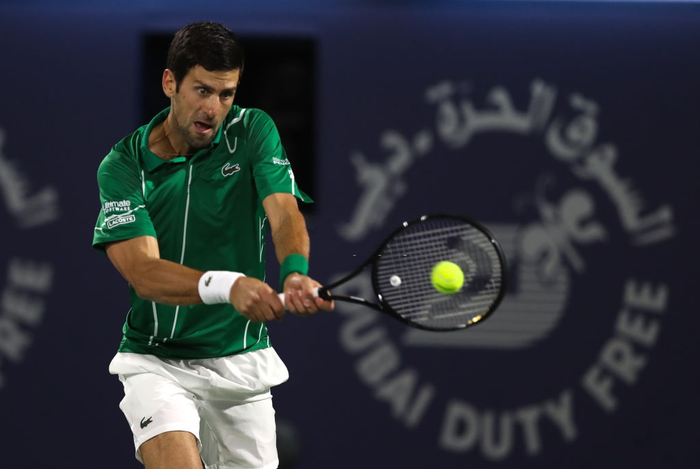 Djokovic lại thể hiện bản lĩnh tuyệt vời, thoát hiểm ngoạn mục trước &quot;gã điên&quot; để vào chung kết Dubai Championships - Ảnh 6.