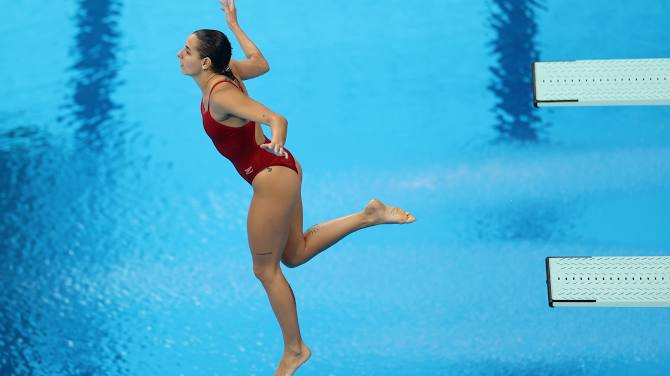 Nữ VĐV Canada lỡ cơ hội lọt vào chung kết môn nhảy cầu tại Olympic vì bài nhảy 0 điểm - Ảnh 2.