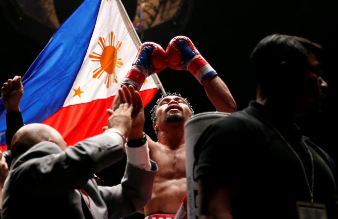 Manny Pacquiao: Từ cậu bé phải bỏ sỏi vào túi để thượng đài cho tới nhà vô địch thế giới ở 8 hạng cân - Ảnh 1.