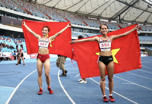 Siêu nhân Nguyễn Thị Oanh quá đỉnh: Vô địch 10.000m, tham gia 4 nội dung hái cả 4 HCV - Ảnh 3.