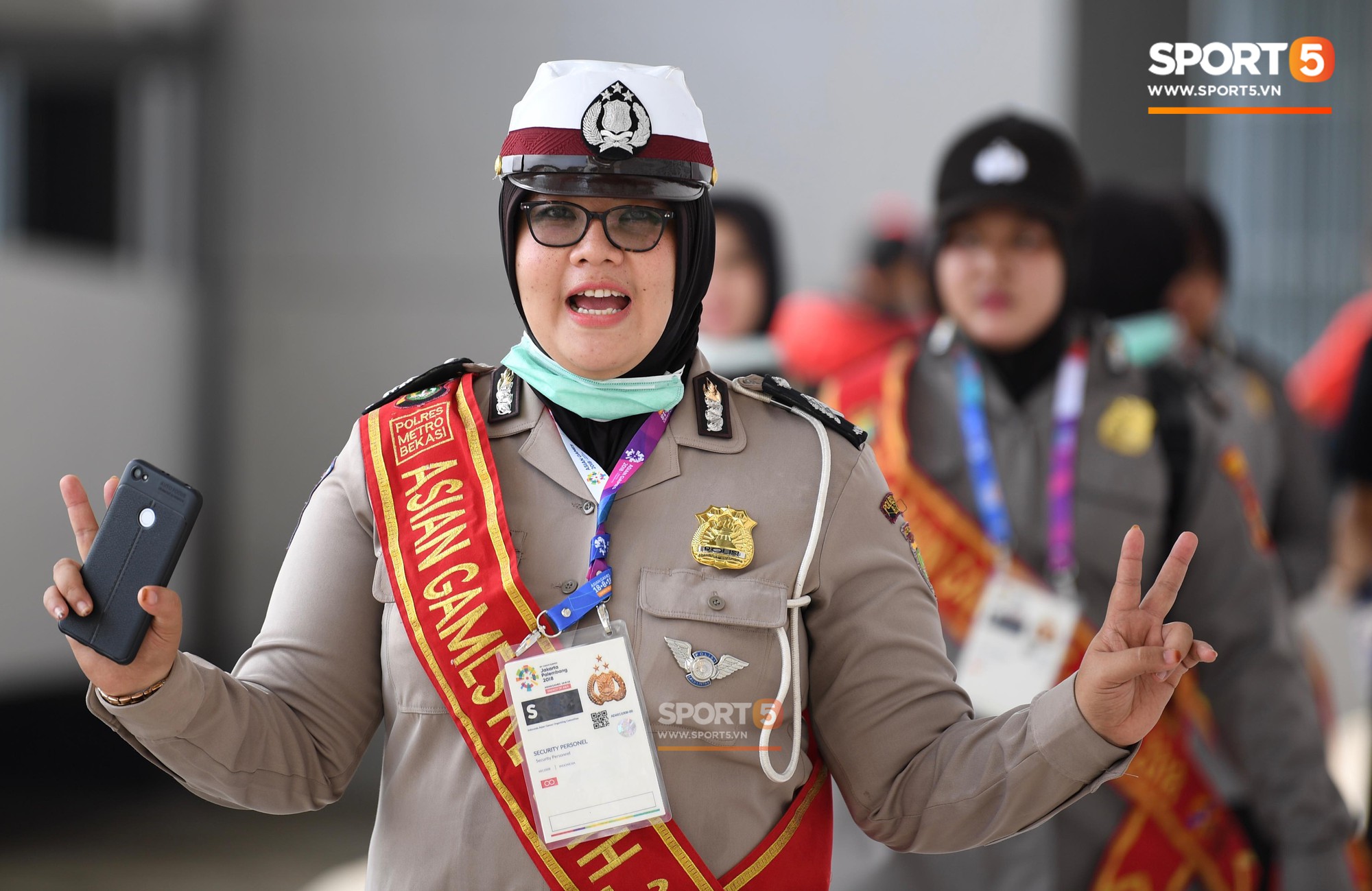 Những nữ cảnh sát xinh đẹp và mạnh mẽ làm nhiệm vụ tại ASIAD 2018 - Ảnh 1.