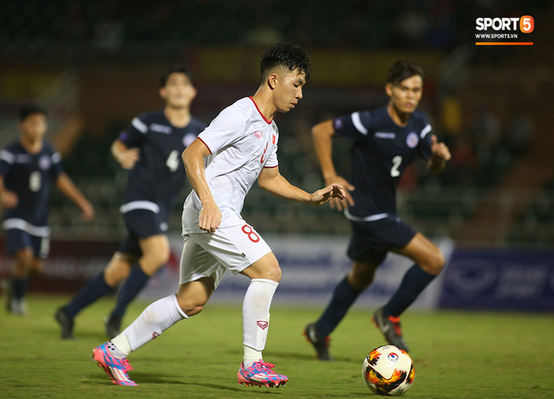 U19 Việt Nam thắng dễ U19 Guam 4-1, phù thủy trắng vẫn nổi điên trong ca-bin đội nhà - Ảnh 13.