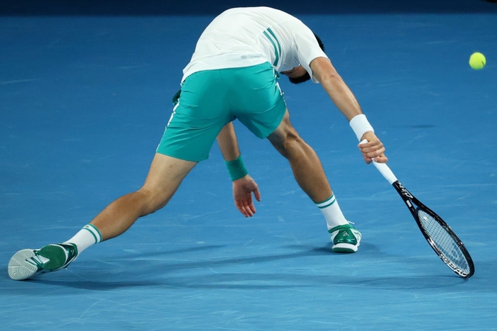 Novak Djokovic nén đau vào tứ kết Australian Open - Ảnh 7.