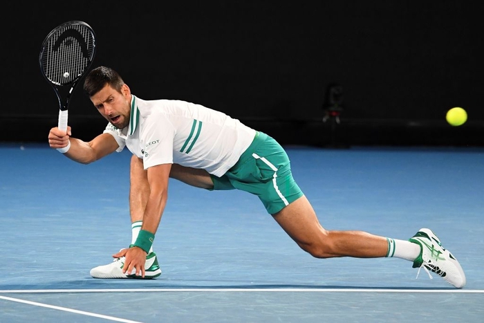 Novak Djokovic nén đau vào tứ kết Australian Open - Ảnh 8.