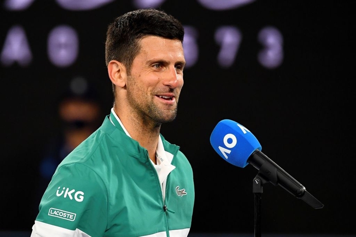 Novak Djokovic trả giá đắt sau trận thắng Raonic - Ảnh 5.