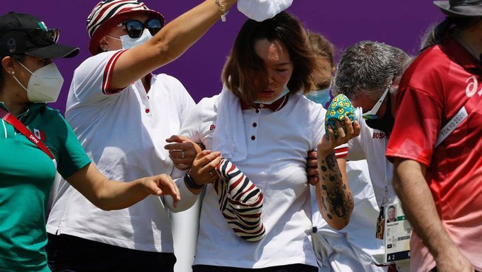Nữ cung thủ ngất xỉu sau khi vừa hoàn thành phần thi tại Olympic Tokyo - Ảnh 3.