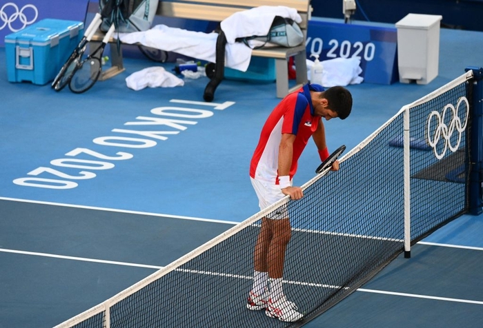 Novak Djokovic trắng tay rời Olympic với 4 trận thua liên tiếp trong 24 giờ - Ảnh 1.