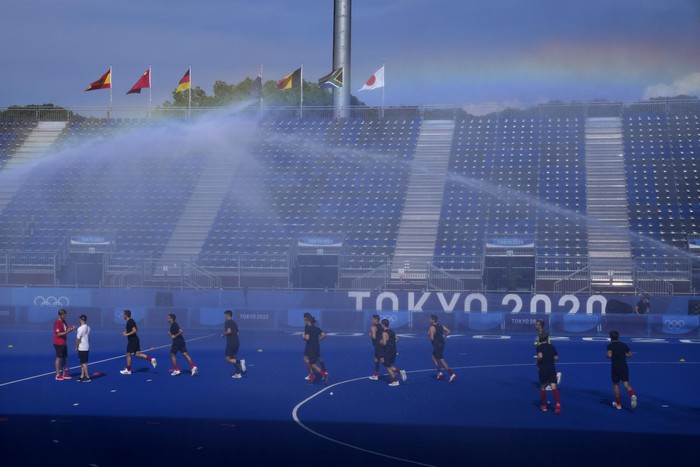 Ảnh Olympic Tokyo 2020: Cầu vồng sau bão và cuộc chiến với nắng nóng của các VĐV  - Ảnh 17.