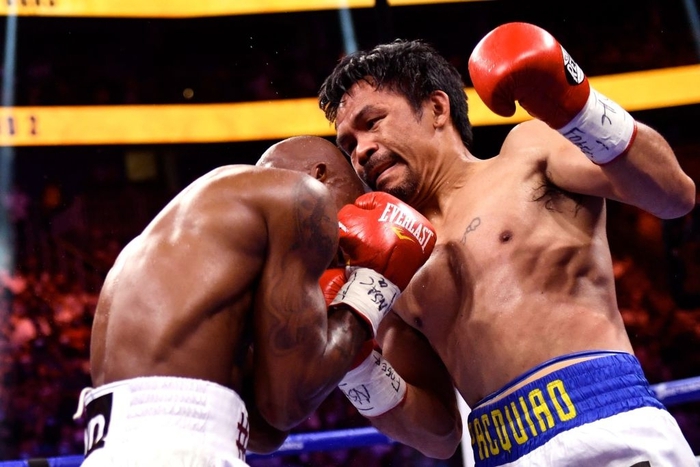 Tụt thể lực khi thi đấu ở tuổi 42, huyền thoại boxing Manny Pacquiao để thua trong trận tranh đai thế giới - Ảnh 1.