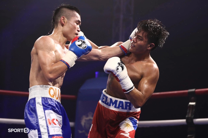 Đinh Hồng Quân thắng đẹp đối thủ Philippines, giành về đai IBF lịch sử cho boxing Việt - Ảnh 1.