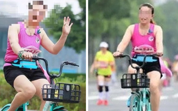Thản nhiên phi xe đạp giữa cuộc thi chạy, lại còn "tự sướng" khi bị chụp ảnh, hai nữ VĐV nhận về cái kết đắng