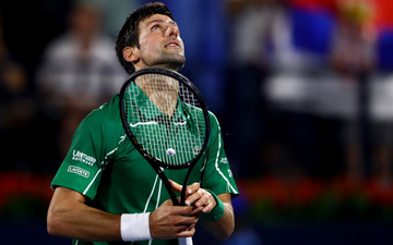 Djokovic lại thể hiện bản lĩnh tuyệt vời, thoát hiểm ngoạn mục trước "gã điên" để vào chung kết Dubai Championships